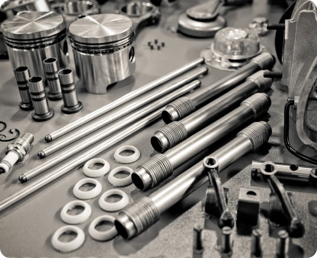 A collection of metal spare parts is used to repair engines.